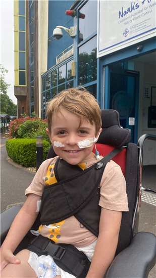 Freddie in his chair outside of the hospital
