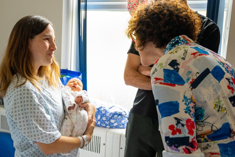 Baroness Merron meeting Tamara Sanchez Cuevas and her baby, Maternity service user, in clinical setting