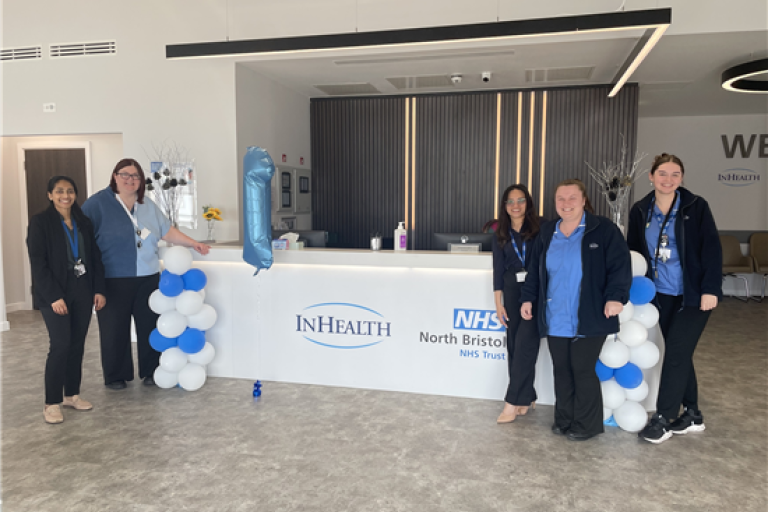 Staff pose inside Weston Community Diagnostic Centre with balloons