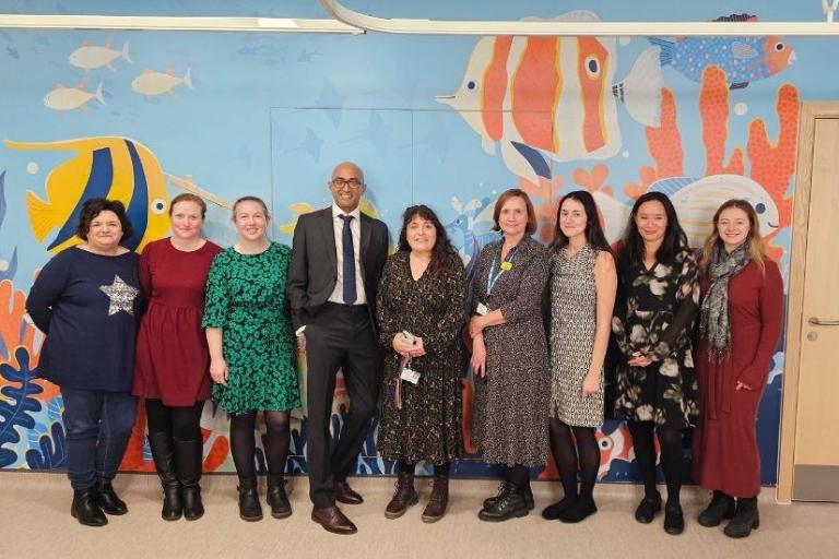 Bristol Royal Hospital for Children research team pose for group photo outside the The Coral Reef research centre