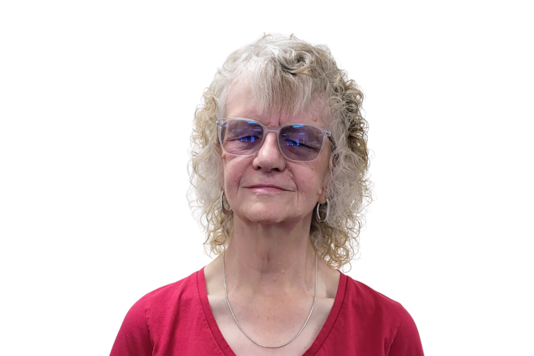 Heather Armstrong smiling to camera against a white background