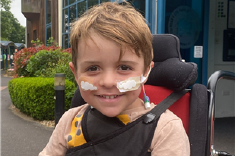 Freddie in his chair outside of the hospital