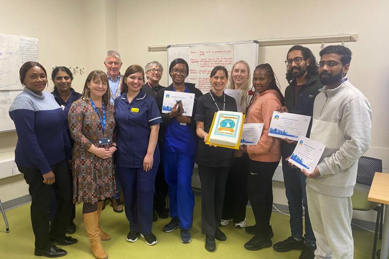Preceptorship programme graduation group photo holding their certificates