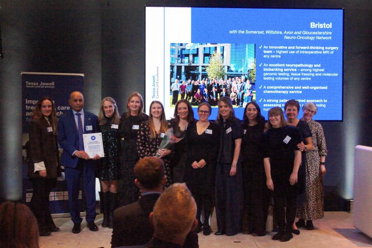 Bristol Neuro-oncology team on stage with their Tessa Jowell Accreditation