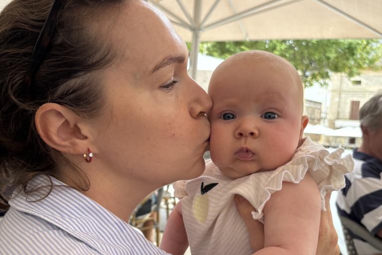 Jessica gives baby Clemmie a kiss on the cheek