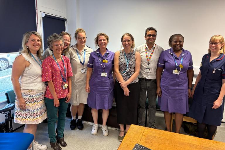 The Paediatric Immunology Service team stood together smiling following their QPIDS accreditation.