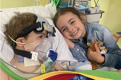 Freddies sister visits him in his hospital bed