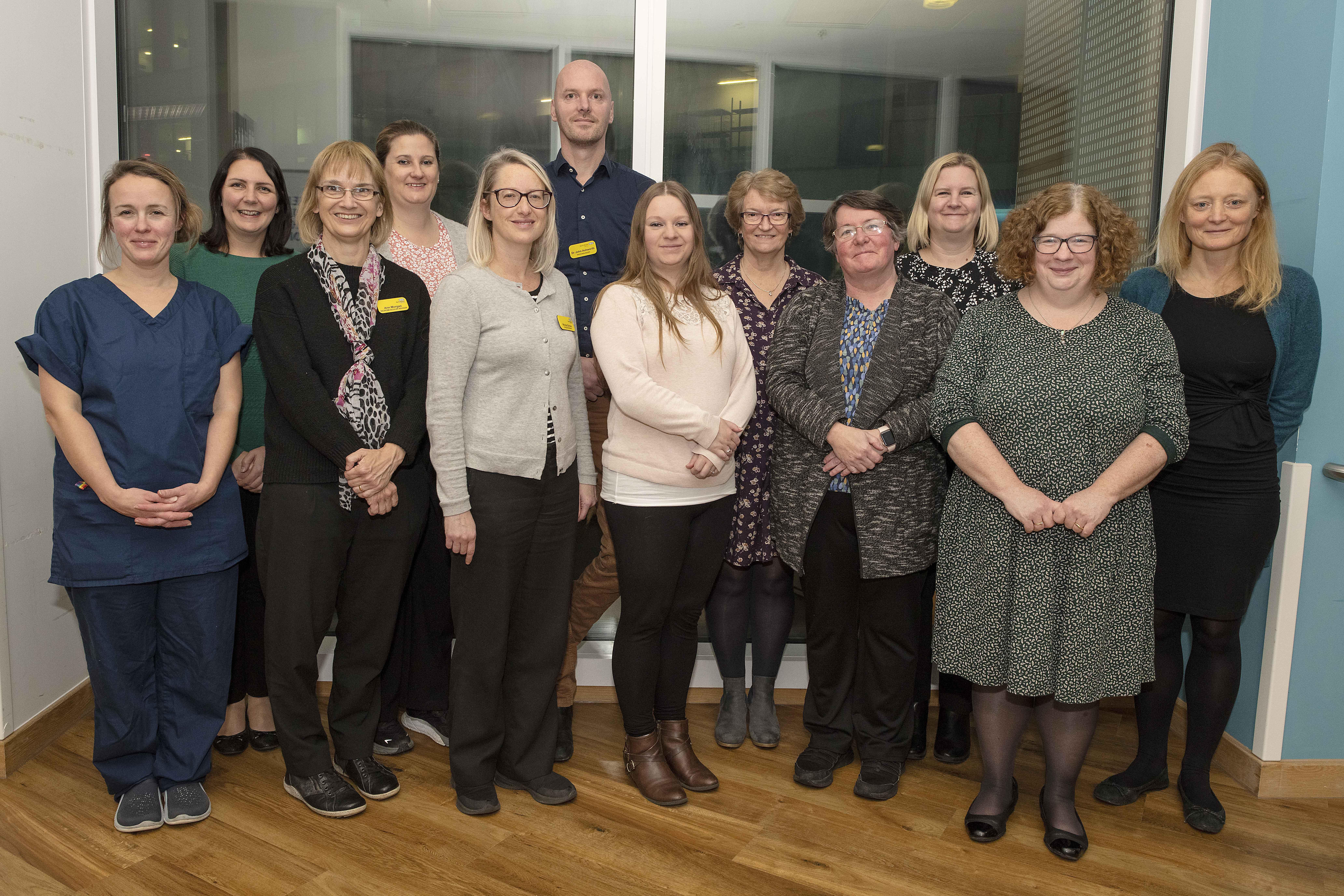 Muscular Dystrophy UK team smile for group photo