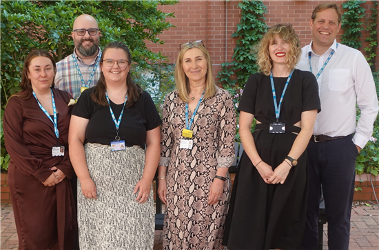 group photo of the Central Outpatients team at Bristol Royal Infirmary